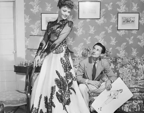 Oleg Cassini works with Gene Tierney