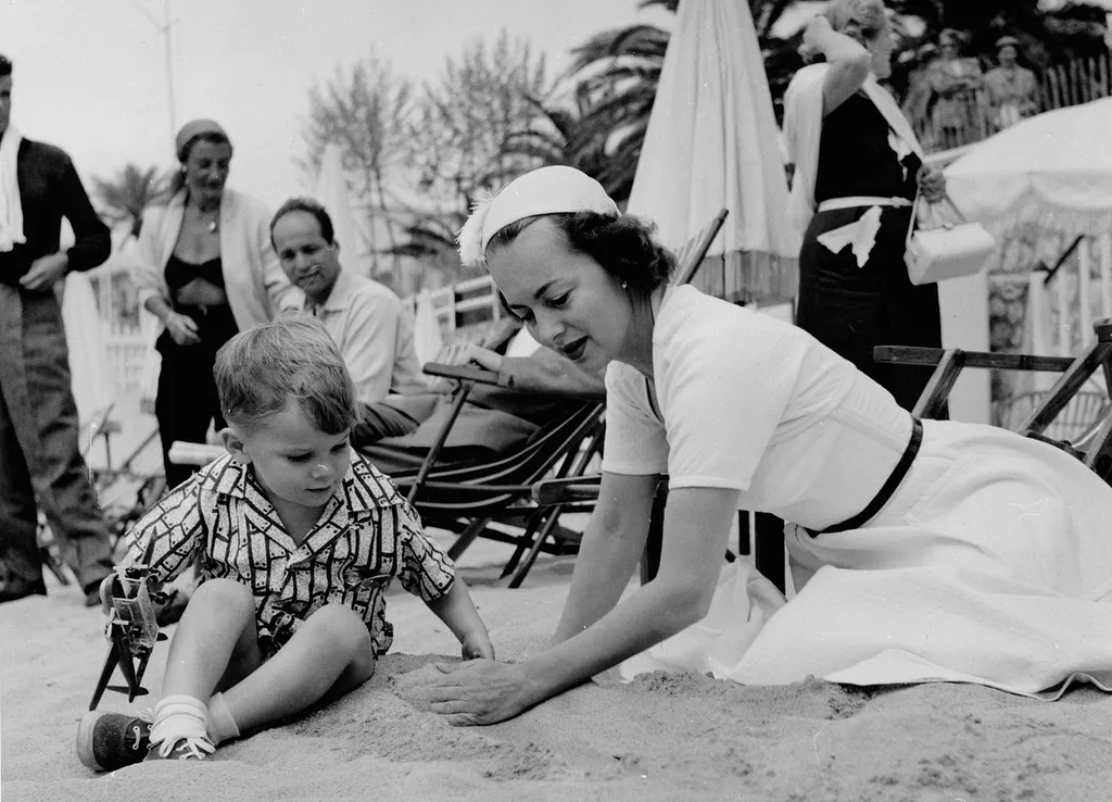 Olivia de Havilland with her son Benjamin Goodrich, Cannes, April 1953