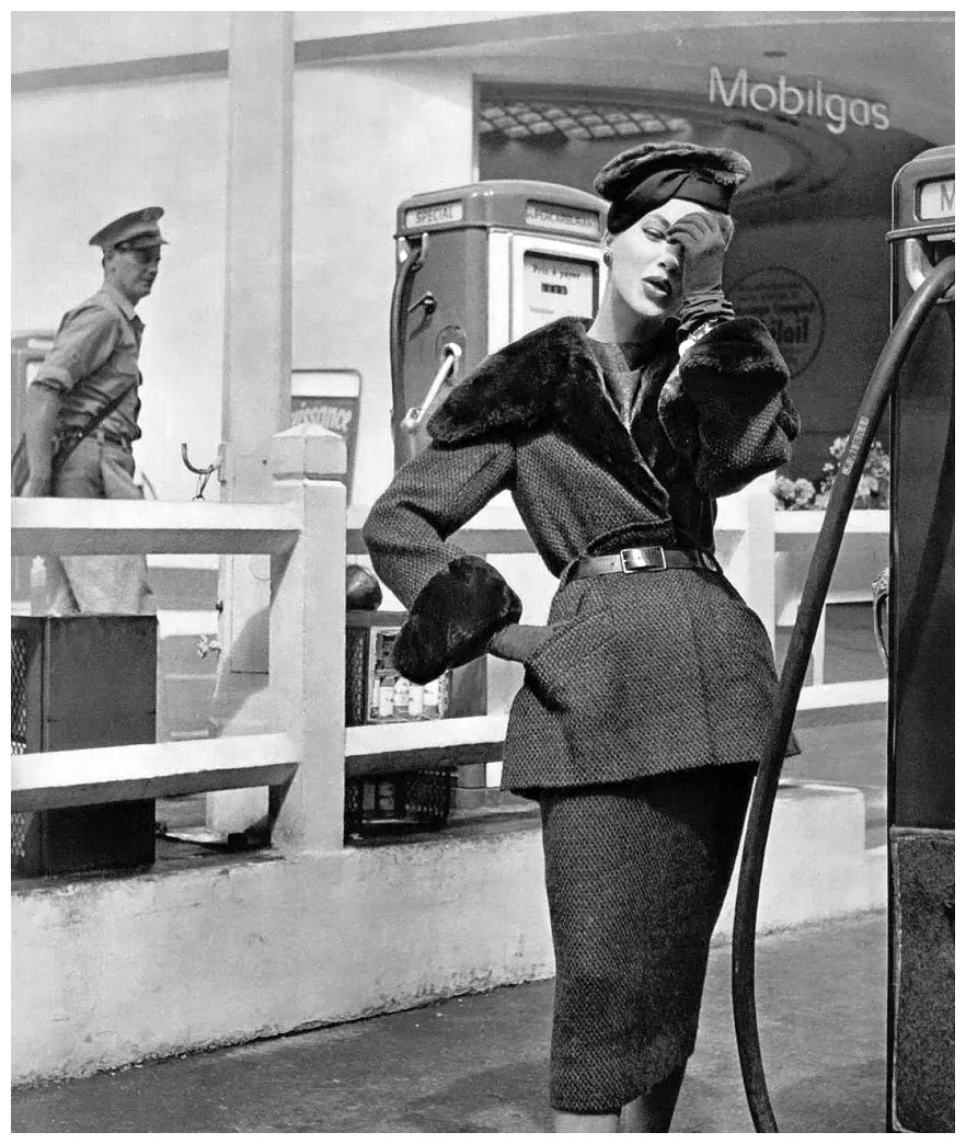 Model in tweed suit trimmed at collar and cuffs in sheared beaver by Pierre Balmain,1955, Photo by Philippe Pottier
