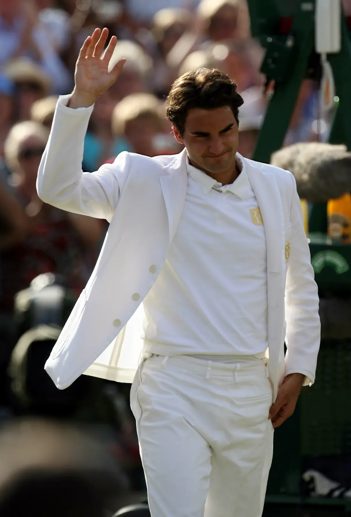 Roger Federer wore a white blazer with a pair of long white trousers at Wimbledon, 2007