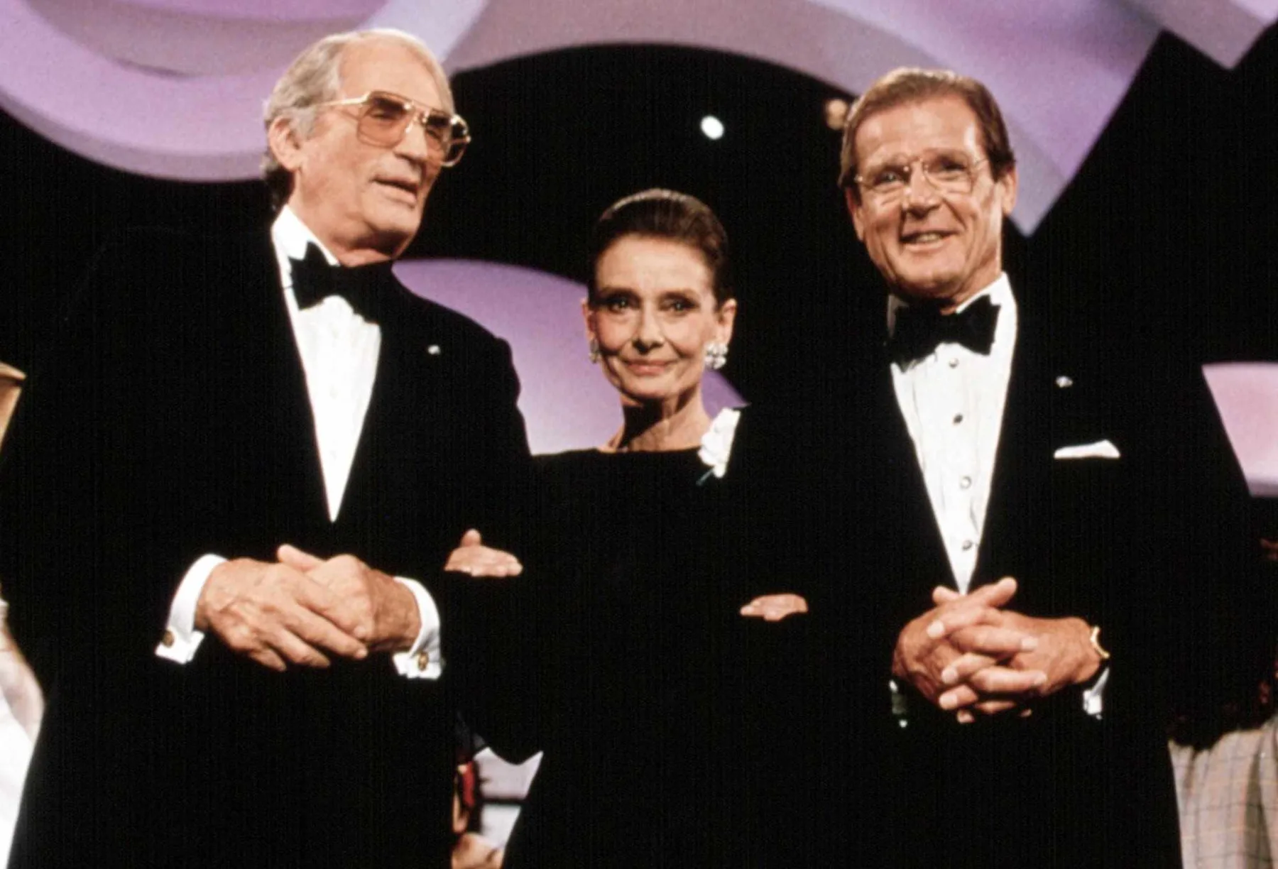 Roger Moore with his friend Audrey Hepburn and Gregory Peck