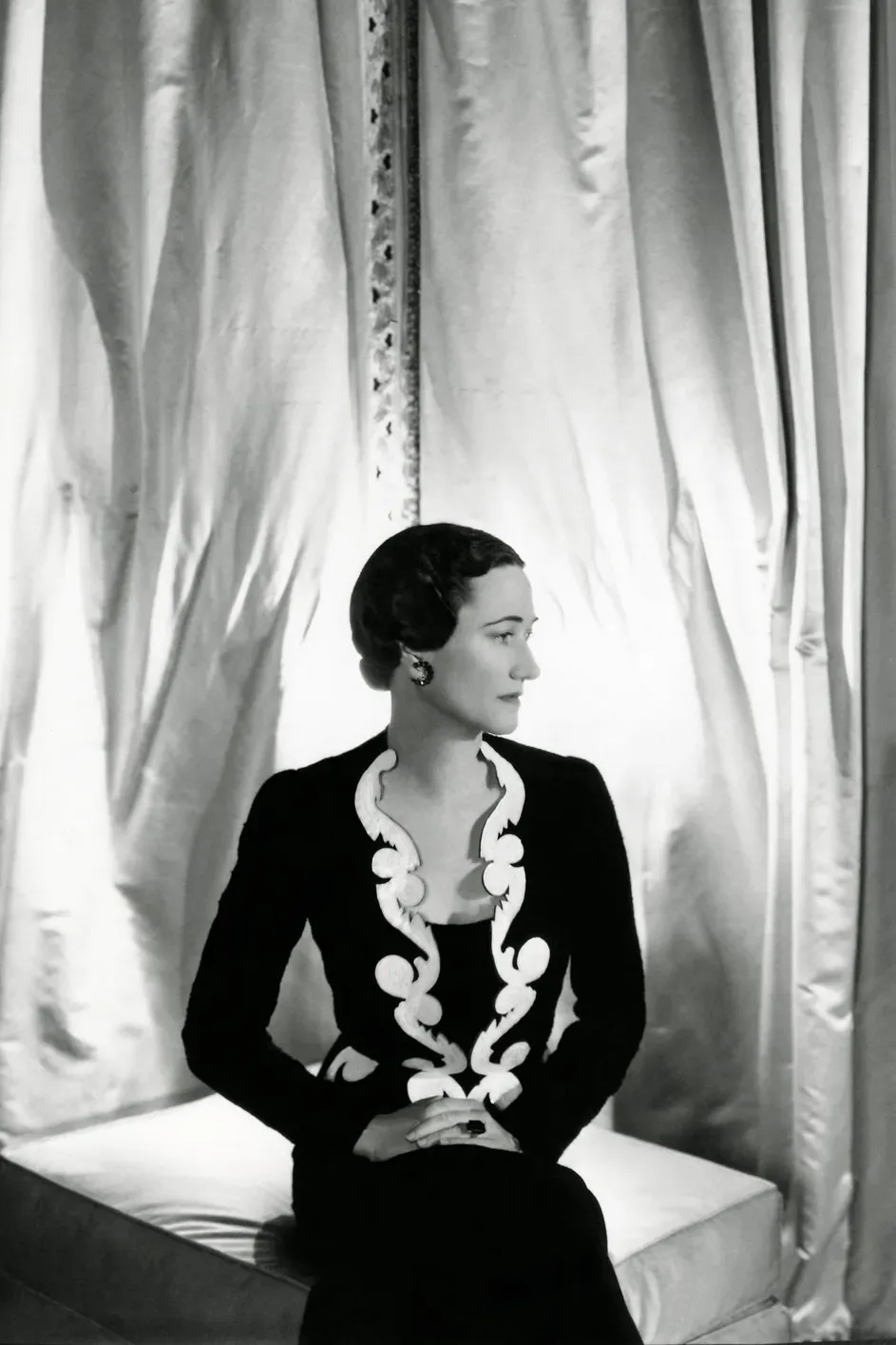 Duchess of Windsor remained a fixture of international best-dressed lists for decades, closely associated with Mainbocher, her favorite designer, and with jewelers including Cartier