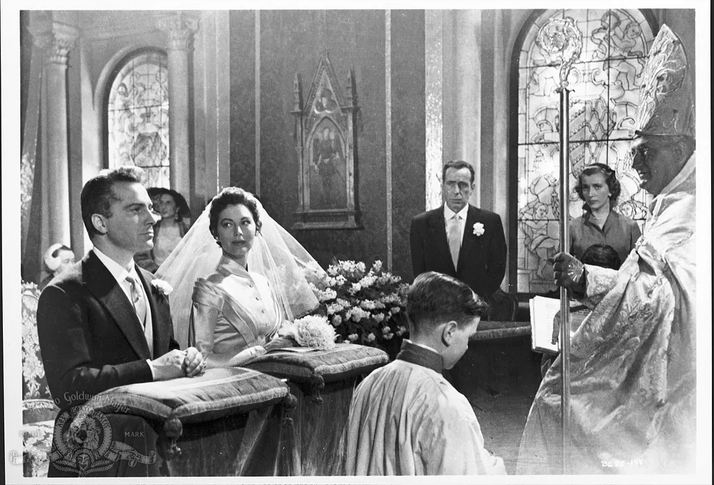 Ava Gardner as Maria Vargas in a Sorelle Fontana wedding dress with Rossano Brazzi in The Barefoot Contessa (film, 1954)