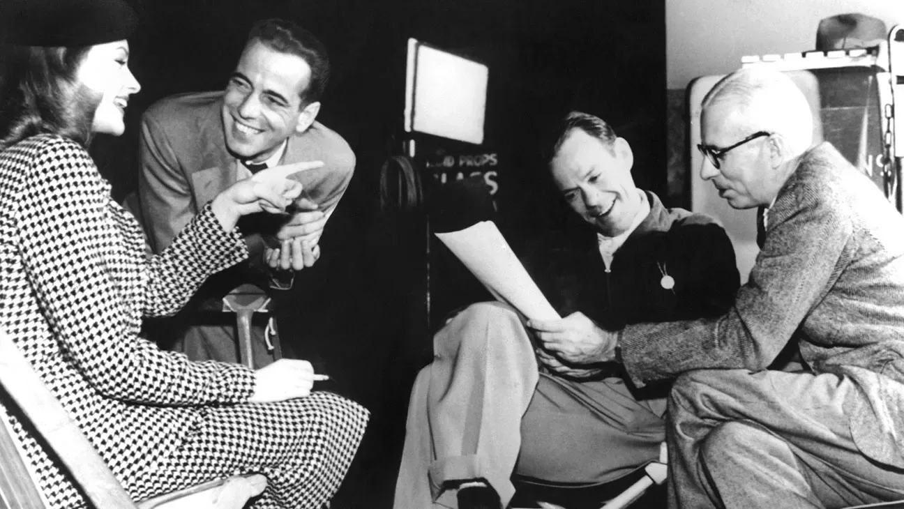 Howard Hawks directing Humphrey Bogart and Lauren Bacall on the set of To Have and Have Not, 1944